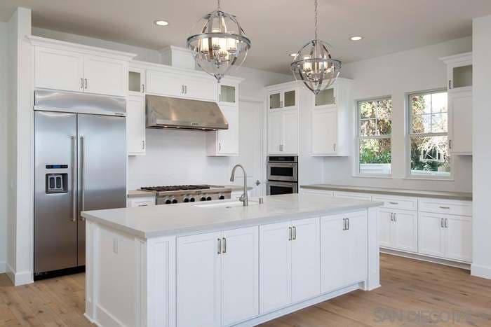 Picture of a newly remodeled kitchen with new cabinets and kitchen luxury countertops