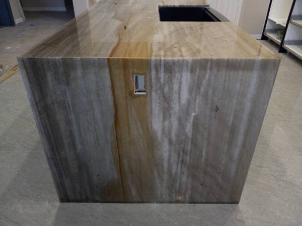 picture of a newly remodeled granite kitchen island